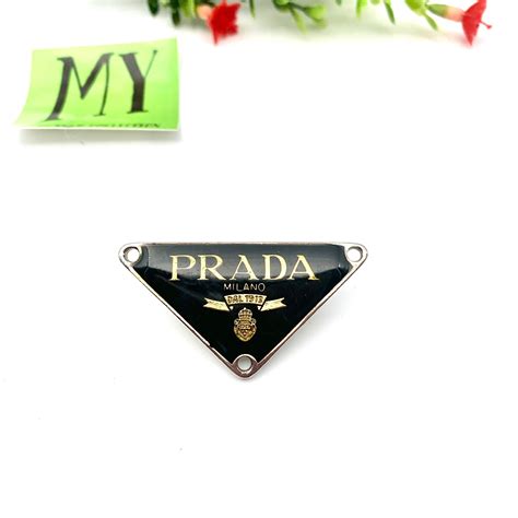 Prada Metal Logo for sale 